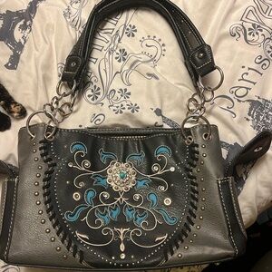 I have a black and grey bag barely used I’m not sure on the brand